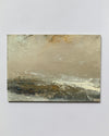 An abstract landscape painting on canvas, featuring textured brushstrokes in beige, gray, white, and dark brown, displayed against a neutral light gray background.