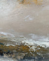 Abstract landscape painting with textured brushstrokes in beige, gray, white, brown, and black, depicting a coastal or desert-like scene with layered earth tones.