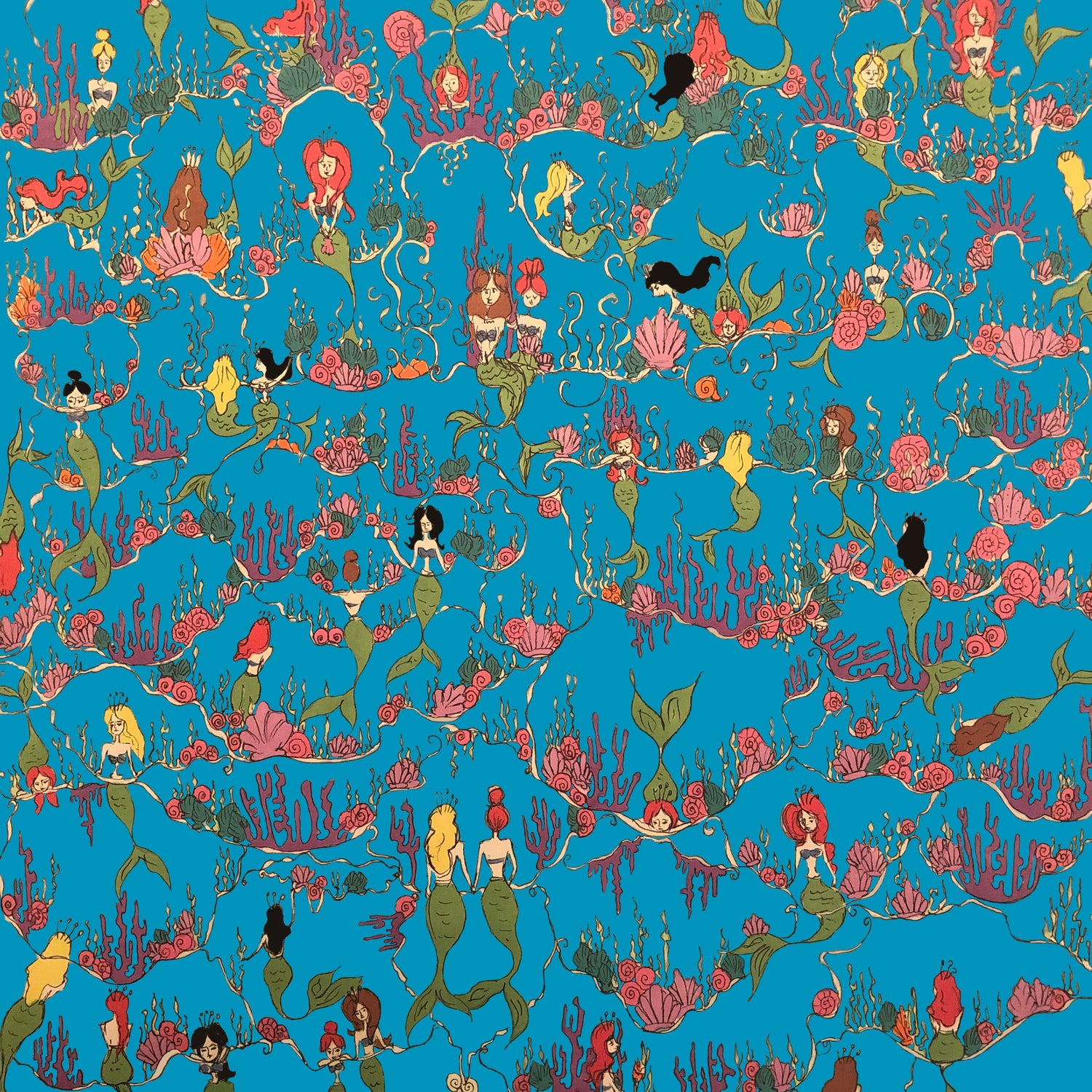 Patterned fabric with mermaids and underwater scenes on a blue background